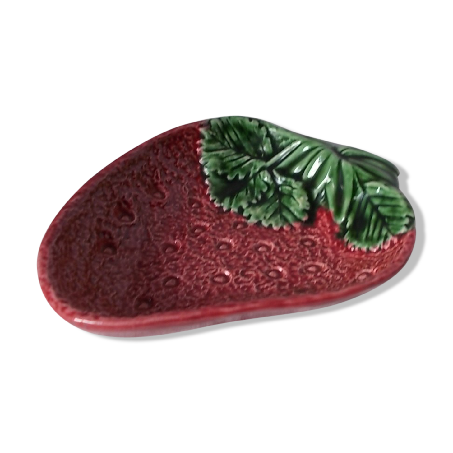 Strawberry-shaped dish in dabbling