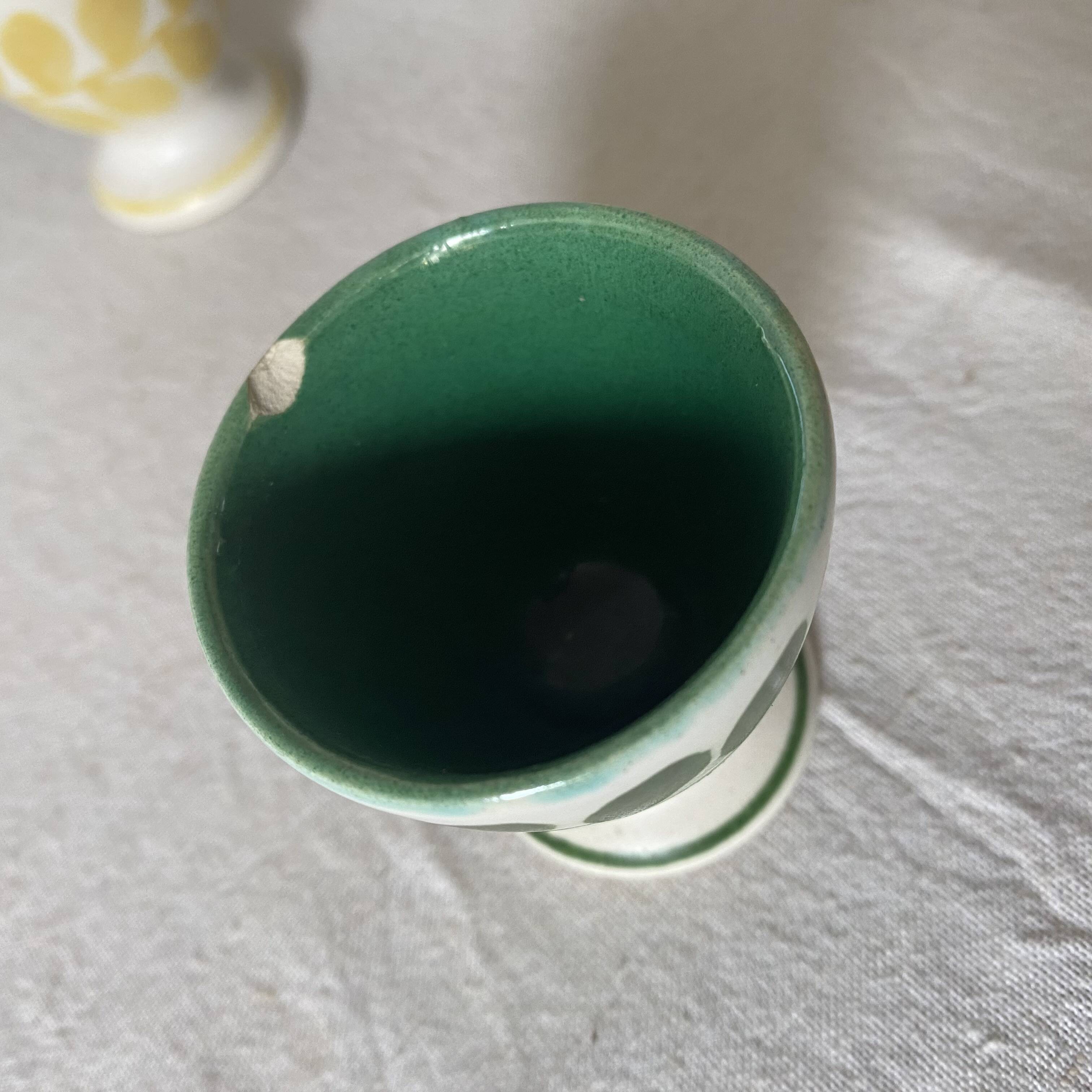 Antique earthenware egg cups