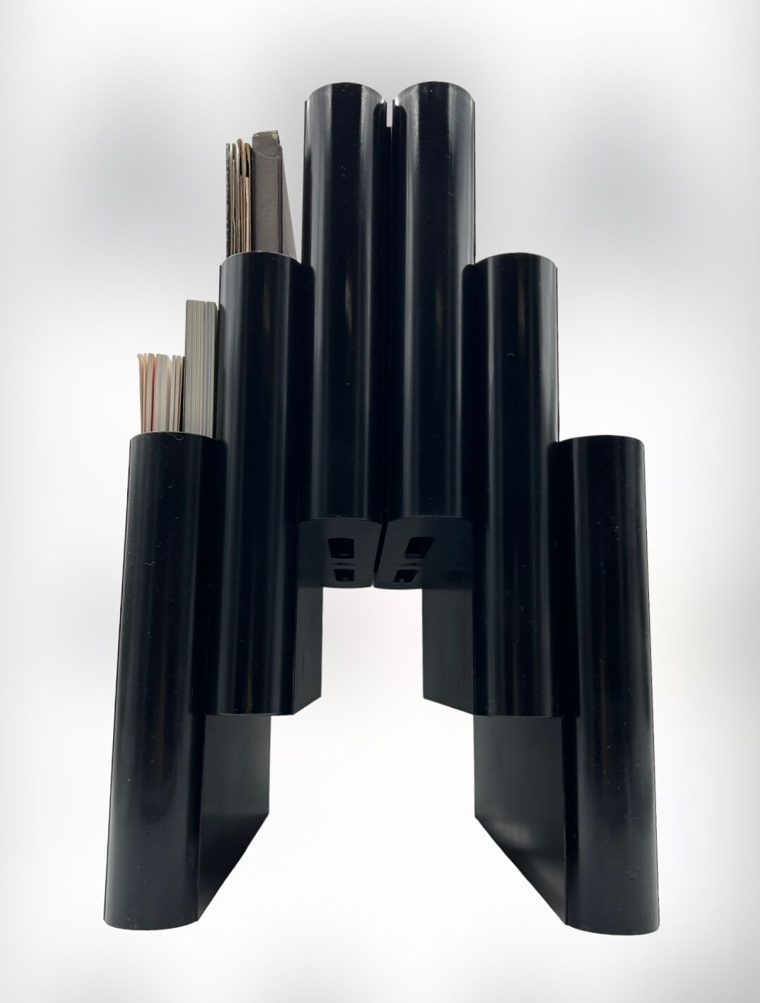 Magazine holder by Giotto Stoppino for Kartell 1970