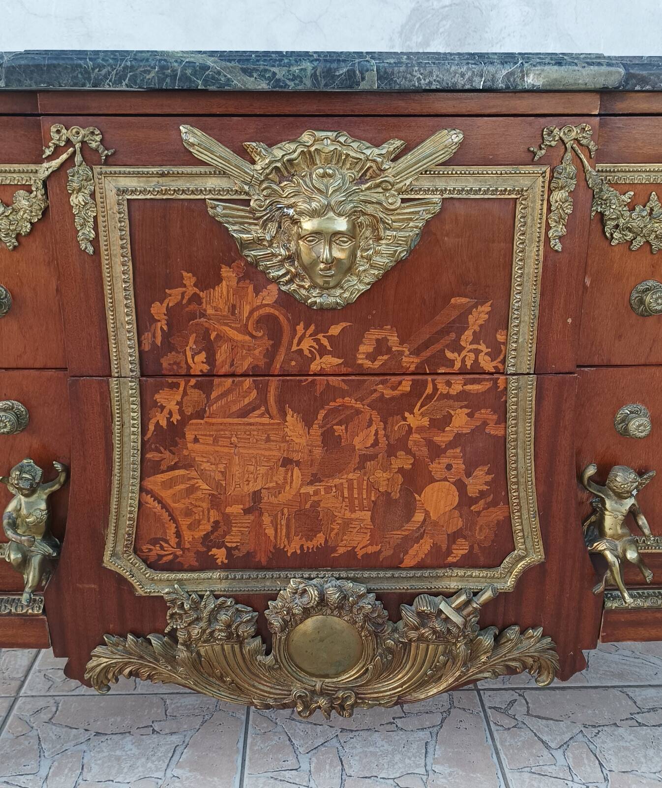 Louis XVI style commode in beech, bronze and marble.