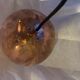 Copper-plated brass globe light fixture