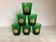Six asymmetrical vintage green glass glasses