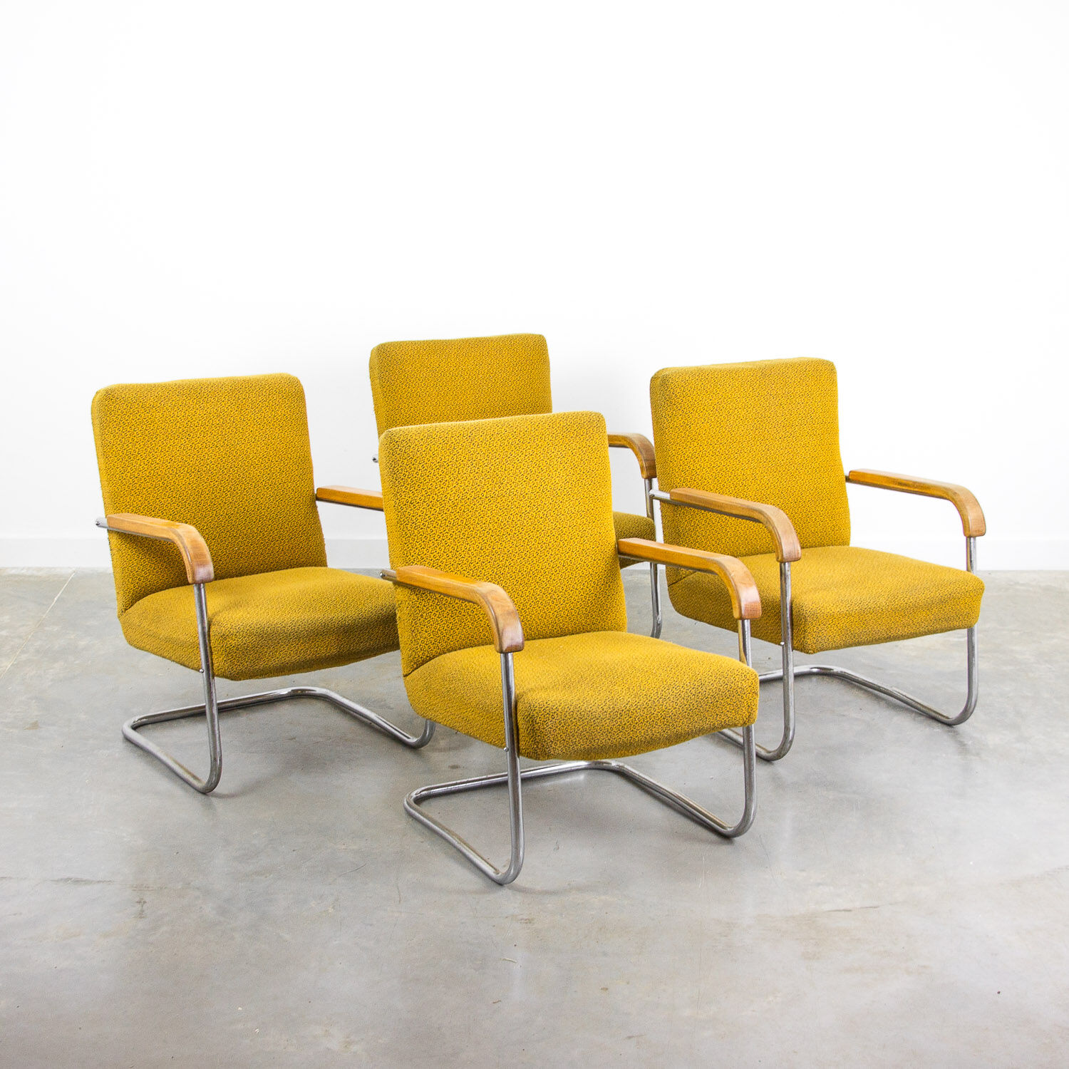 Set of 4 vintage yellow armchairs