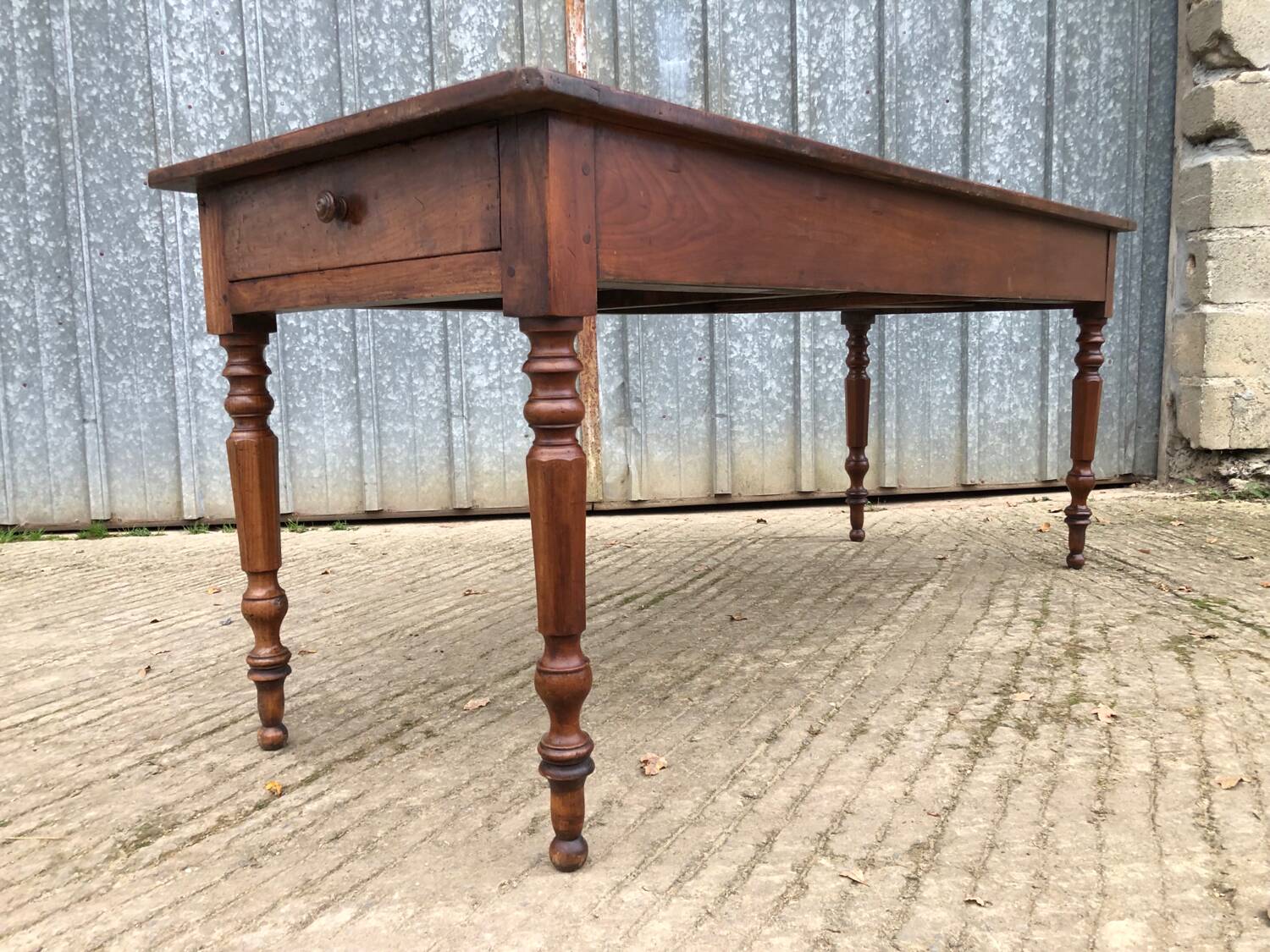 Antique farmhouse table in solid cherry wood with 4 drawers
