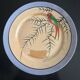 7 iridescent plates with bird decoration