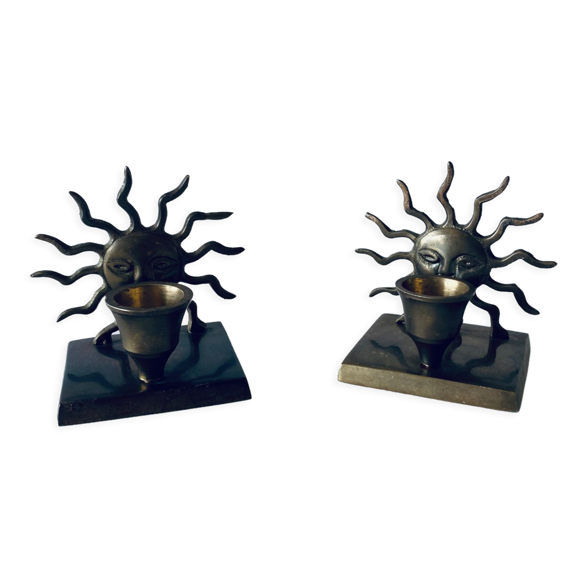 Pair of sun candle holders
