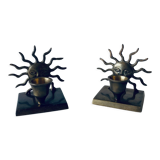 Pair of sun candle holders