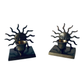 Pair of sun candle holders