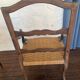 Pair of Louis XV style armchairs in walnut with rush seating.