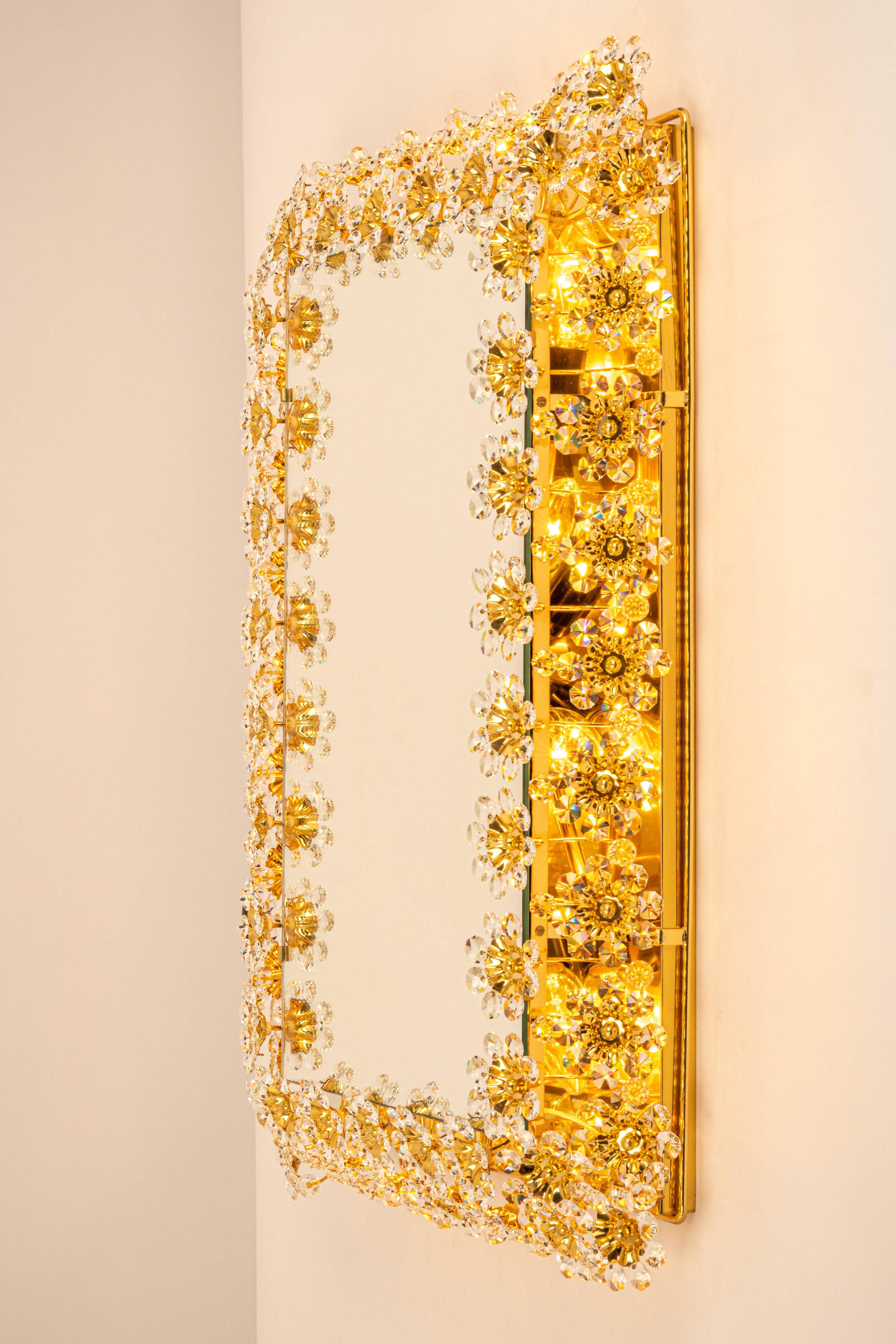 Spectacular backlit mirror in gilded brass and crystal glass by Palwa, Germany.