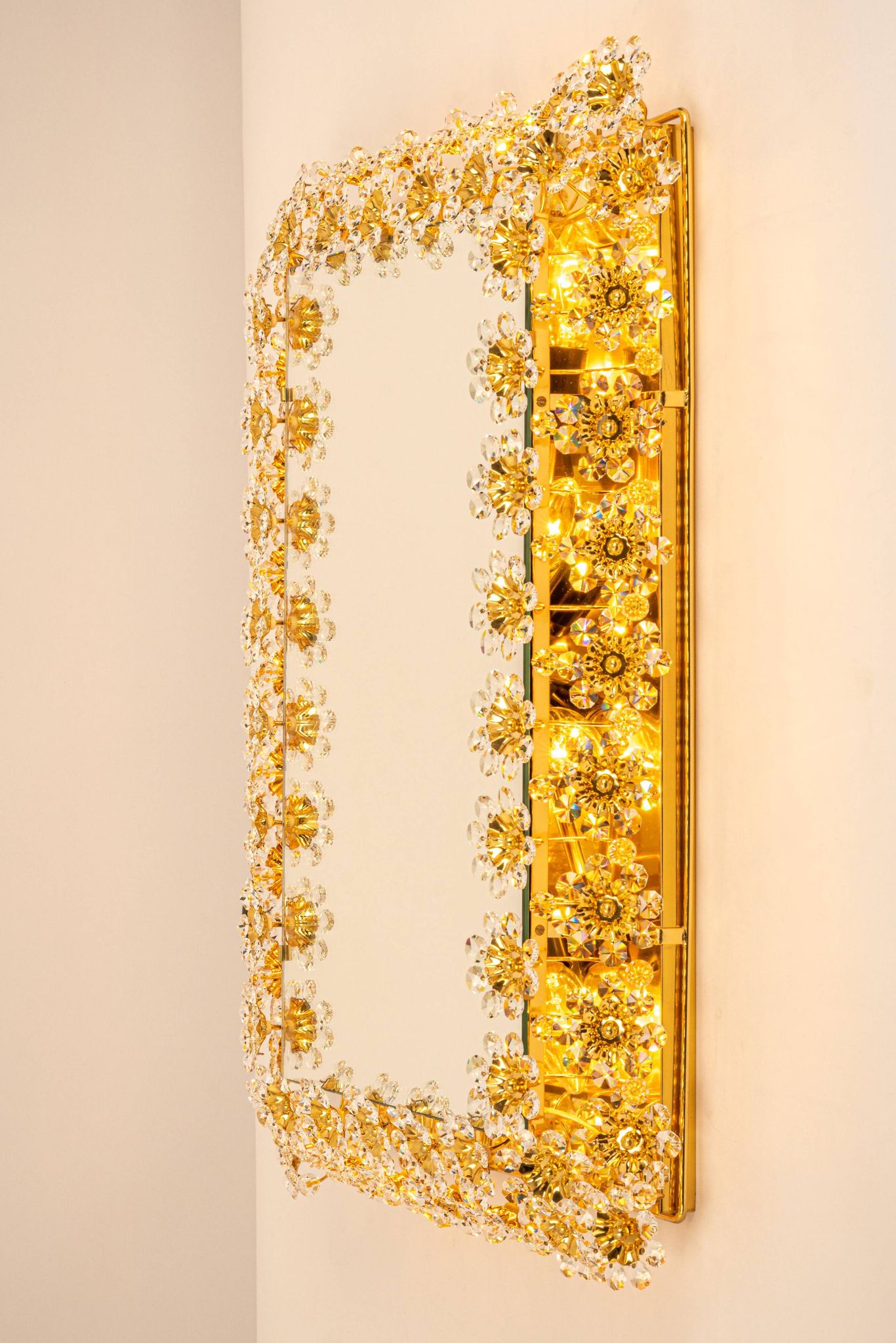 Spectacular backlit mirror in gilded brass and crystal glass by Palwa, Germany.