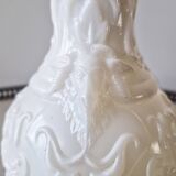 White opaline vase decorated with arabesques and ram's heads