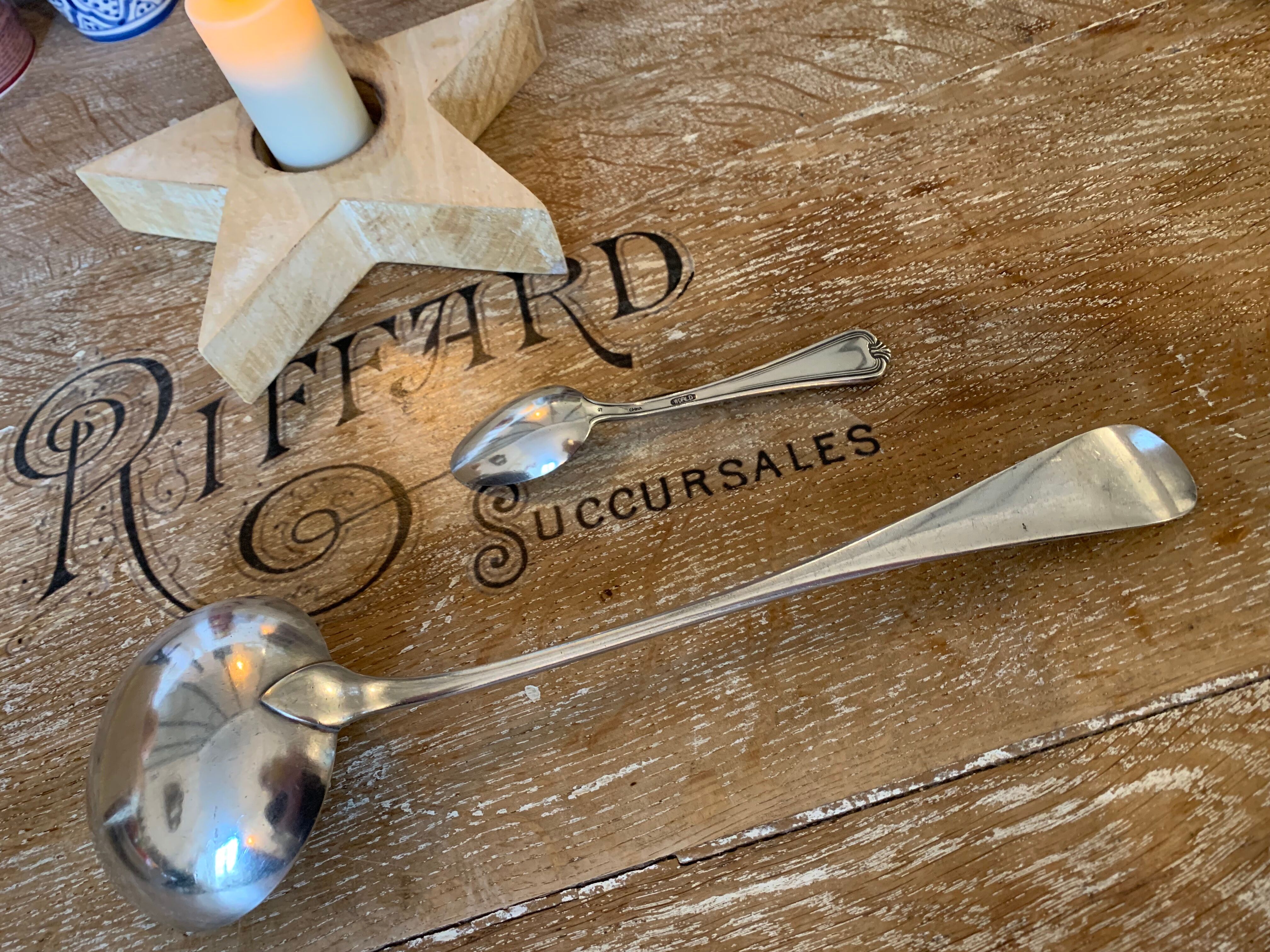 1 ladle and 1 spoon in silver