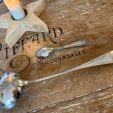 1 ladle and 1 spoon in silver