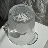 Glass ice or champagne bucket with stylized petal patterns