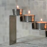 Chrome-plated metal candle holder