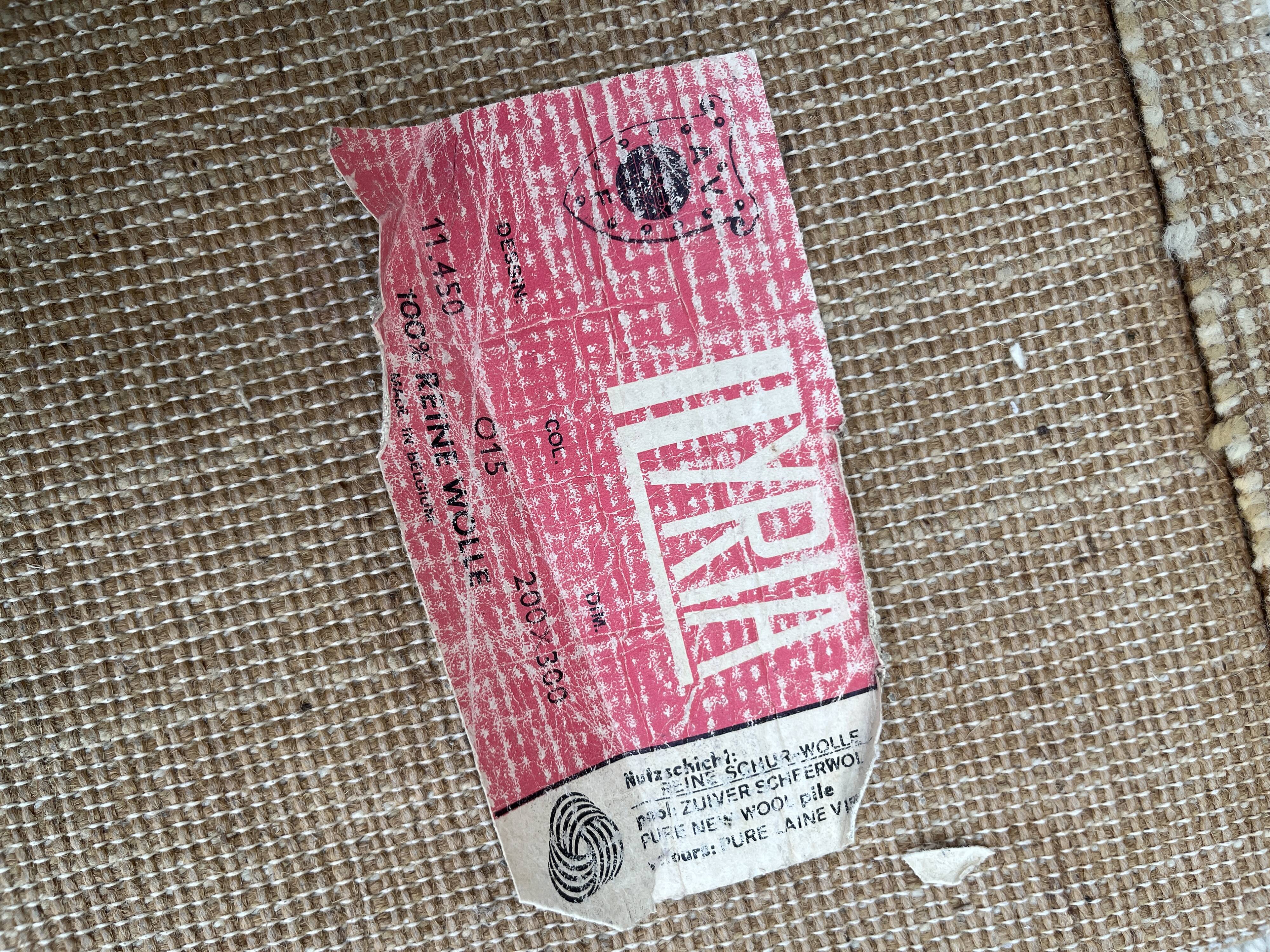 Large rug with floral decoration.