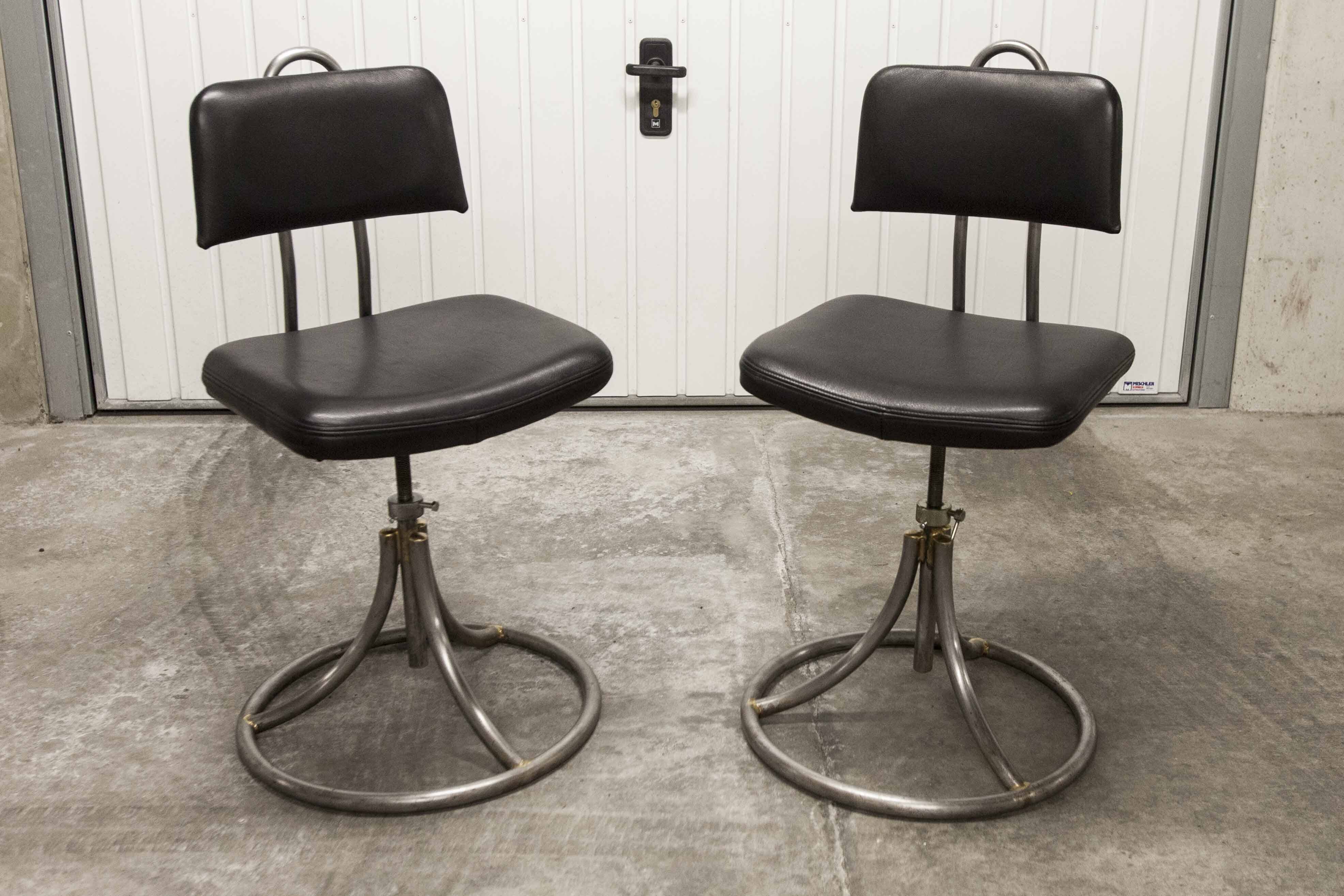 Pair of French Army telegraph operator's swivel chairs, new leather