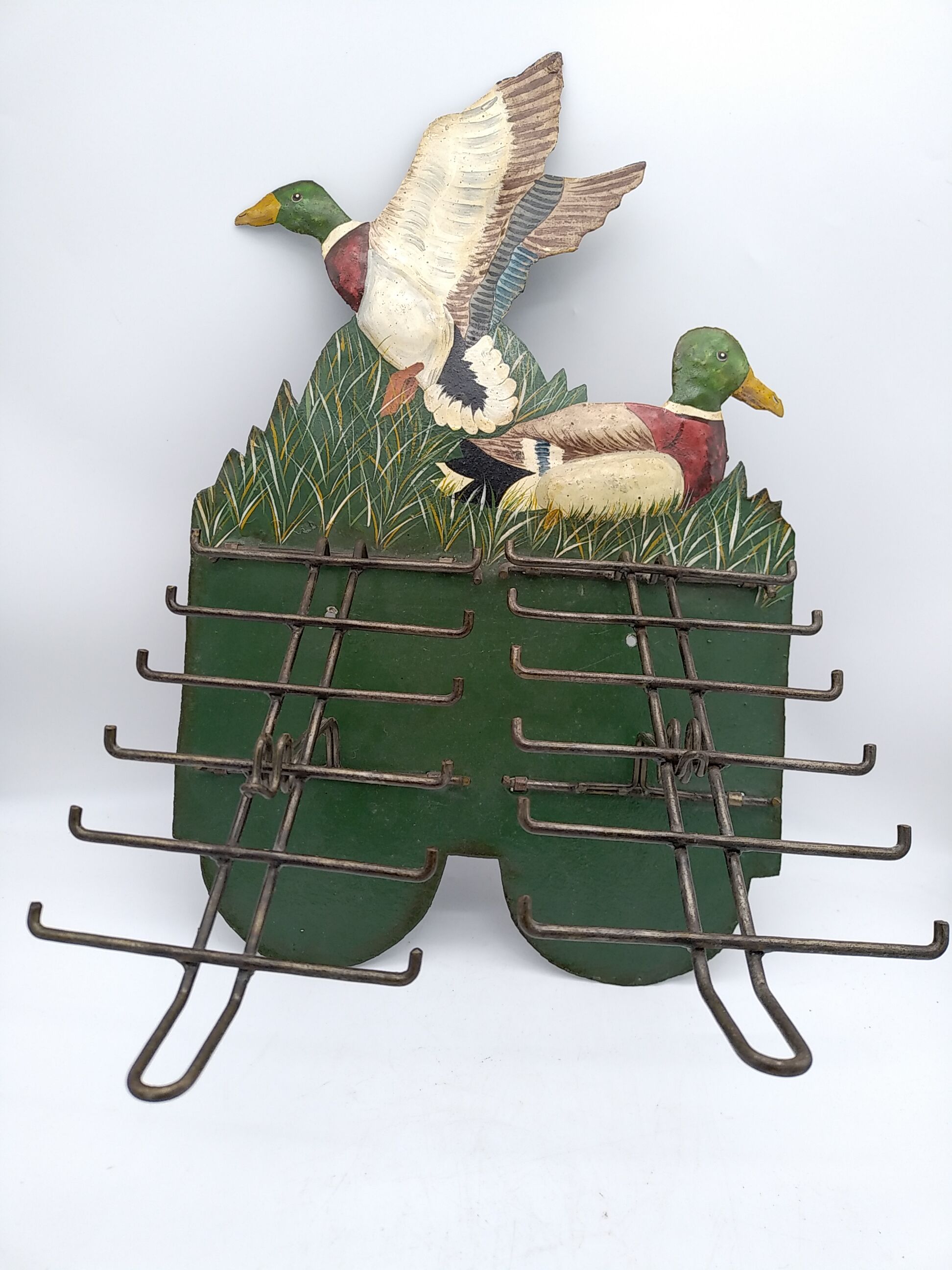 Metal wall tie door with duck decoration. 50s .