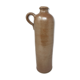 Old stoneware bottle with handle
