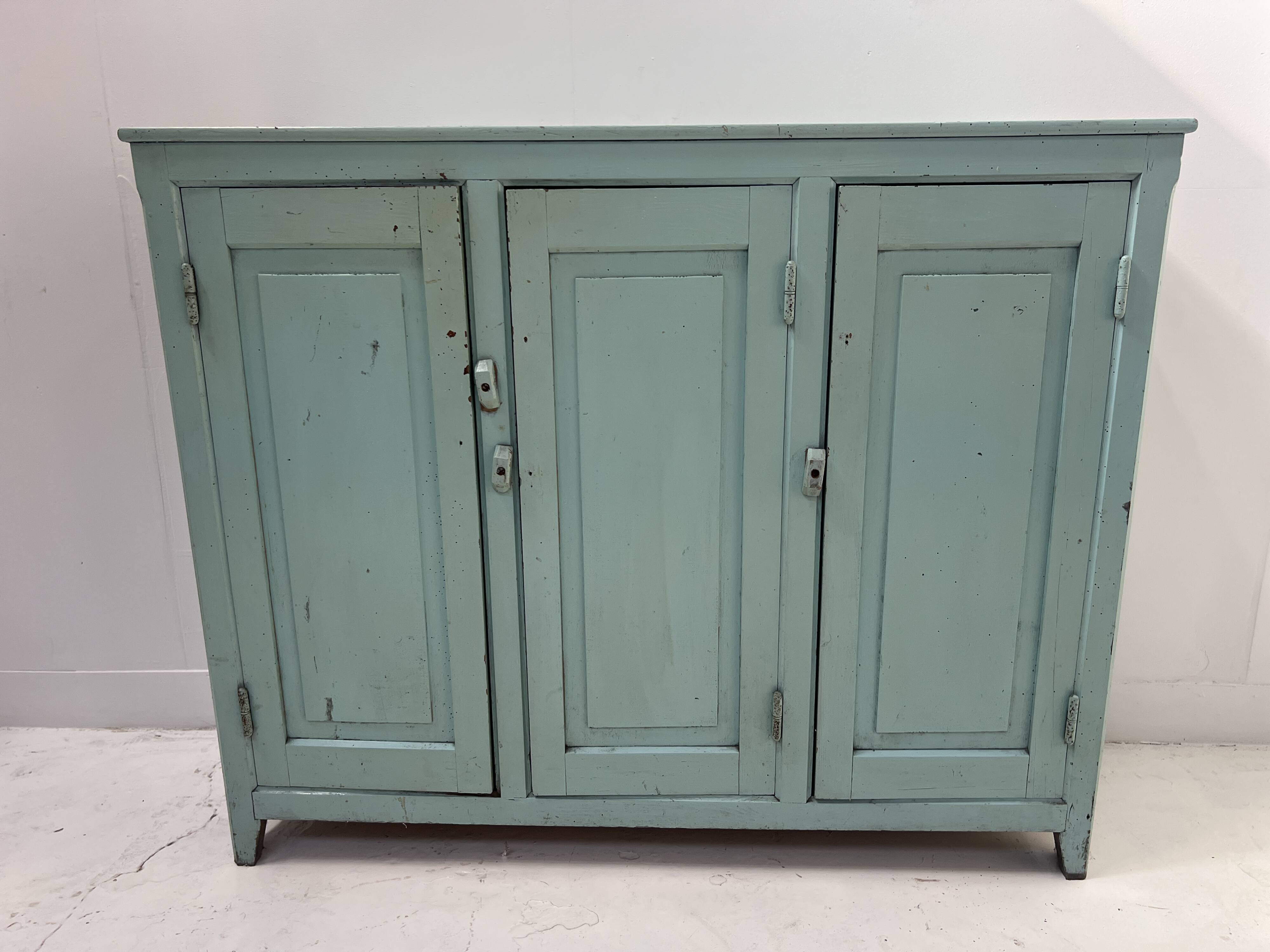 Parisian buffet with three doors in patinated beech, 20th century.