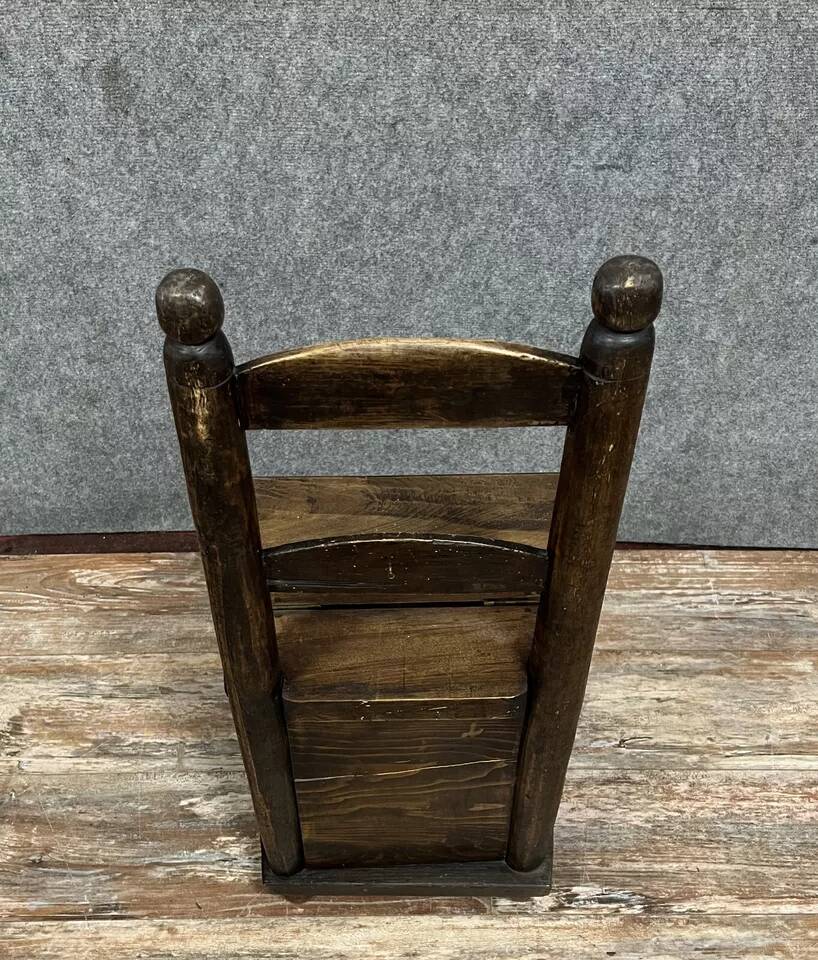 Late 18th century folk art work: child's armchair concealing a chest