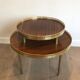 Tripod gueridon in neoclassical style made of mahogany, brass, and a golden metal base.