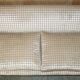 Fabric sofa and footstool, handmade in England.