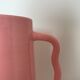 Handmade abstract pink ceramic vase with wavy handmade handmade