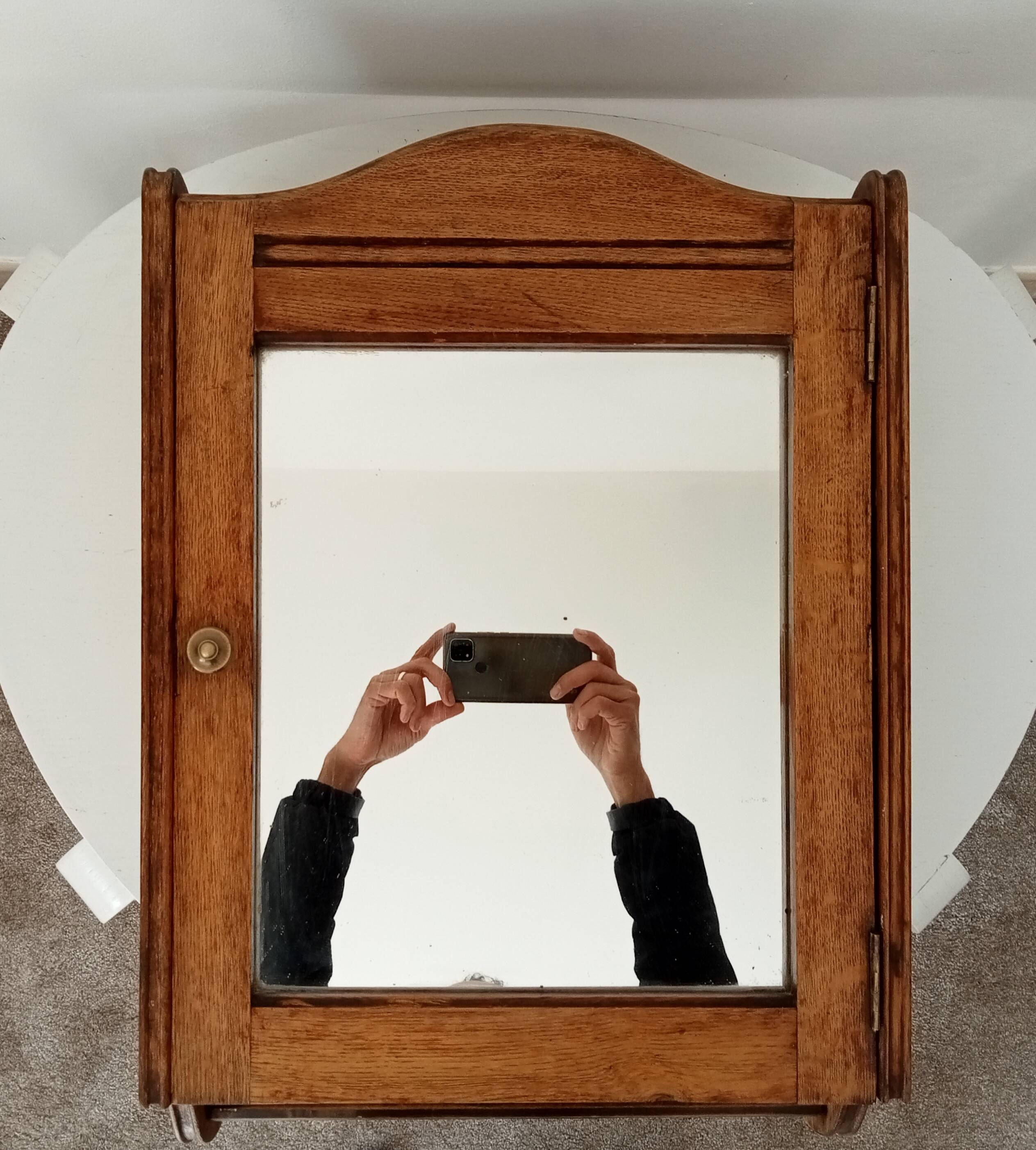 Antique solid oak bathroom cabinet from the early 20th century