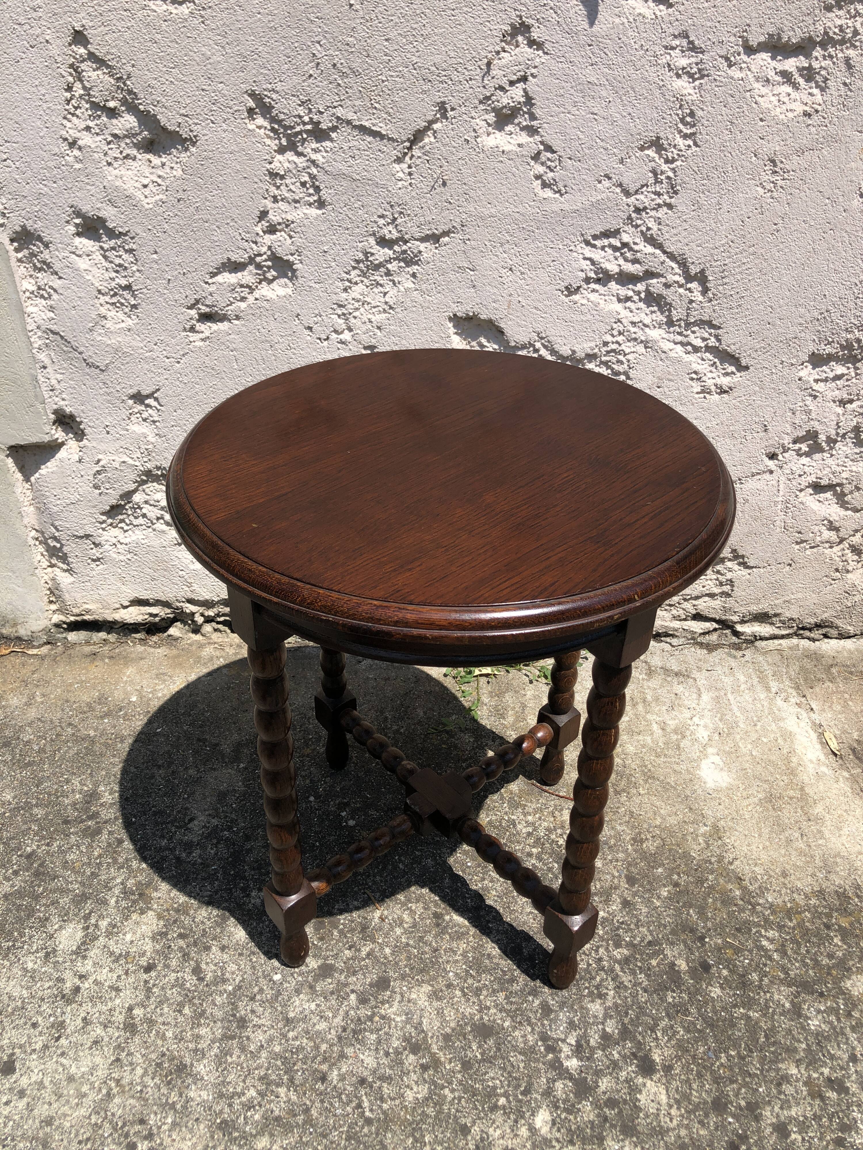 Dark turned wood side table