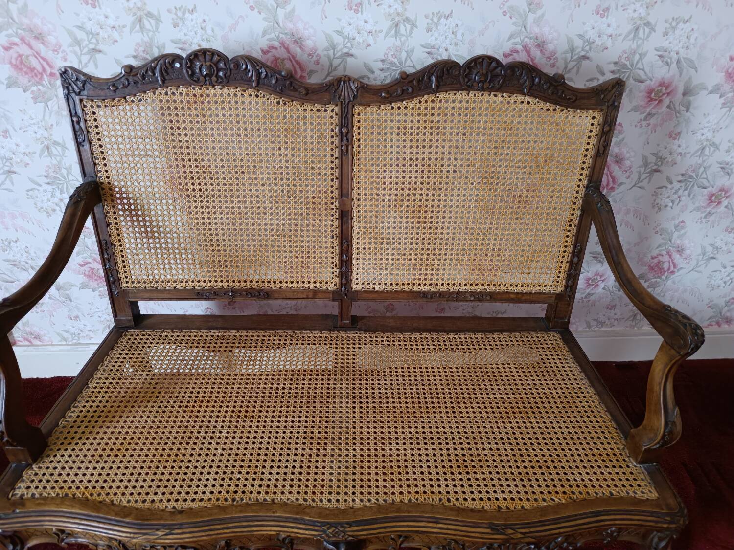 Antique bench in solid carved wood and wicker caning