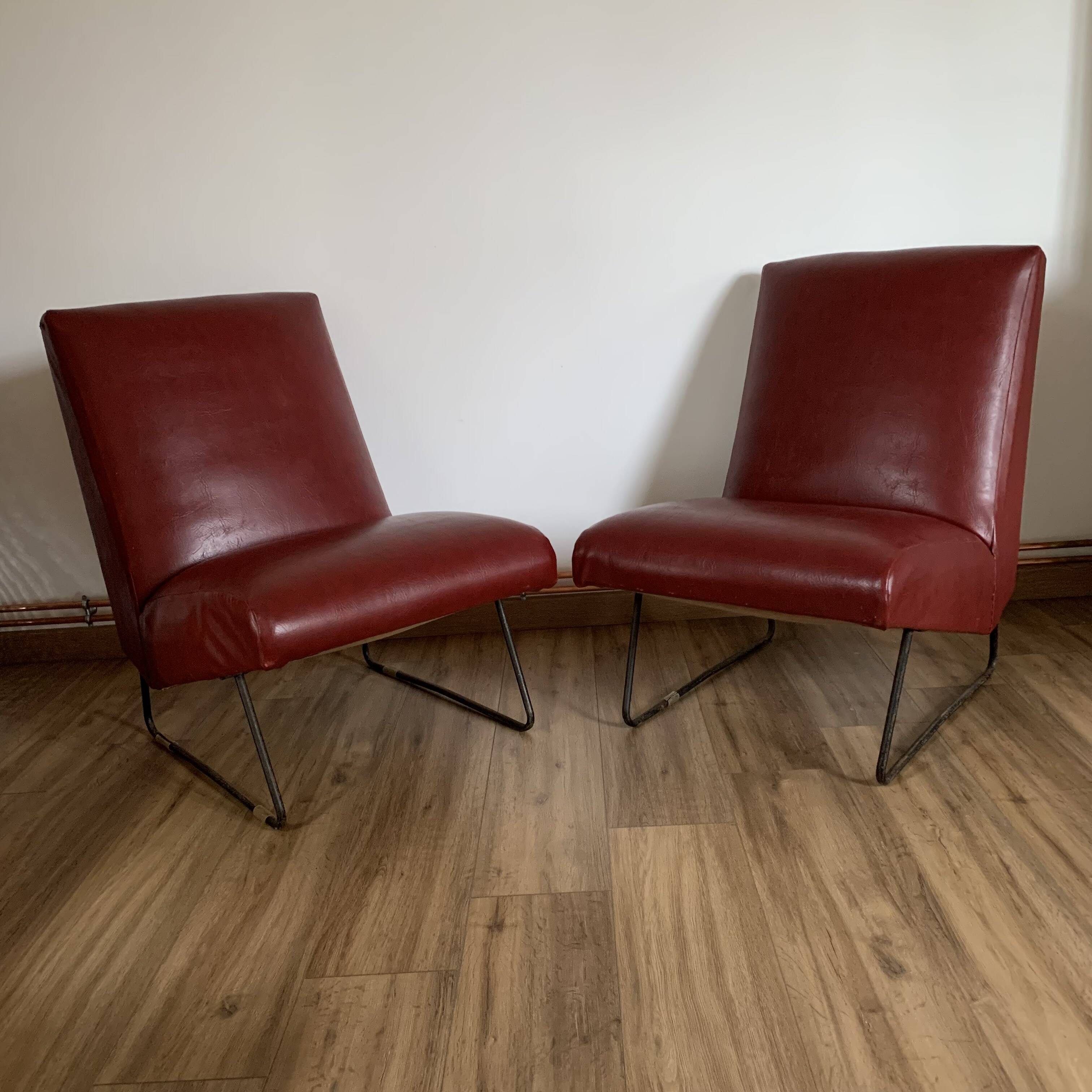 Pair of vintage burgundy red armchairs