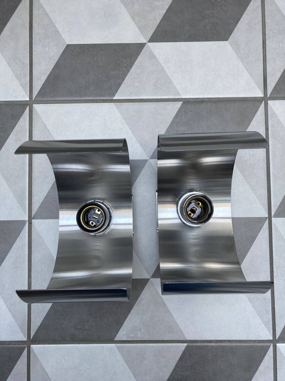 Pair of Space Age brushed metal wall lights