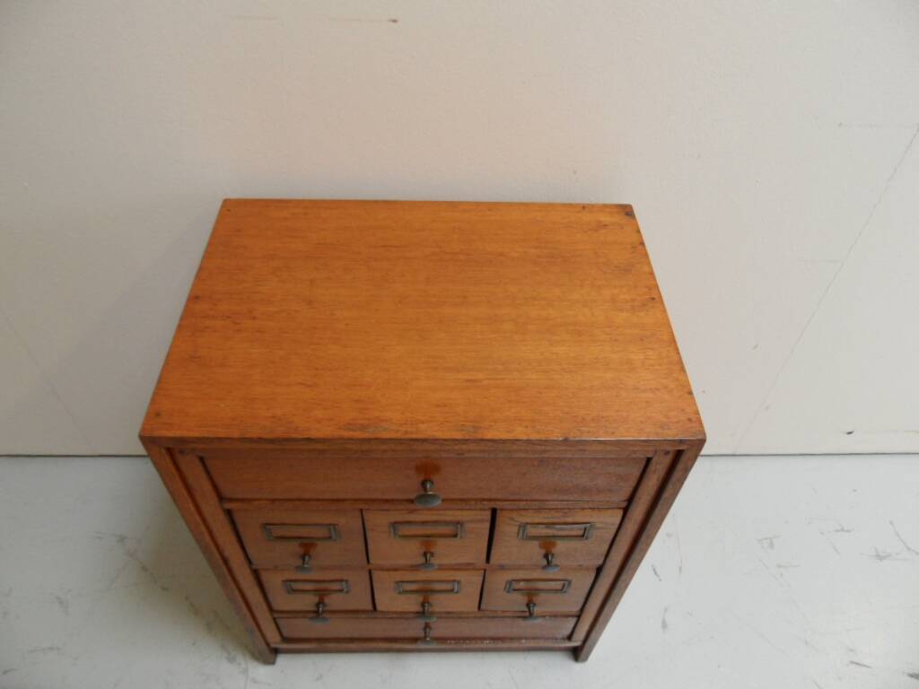 Antique oak watchmakers cabinet with drawers