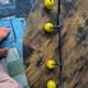 Vintage coat rack Roger Feraud with 4 yellow ball hooks.