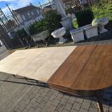 12-foot round oak table with 7 extensions / 20 people