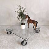Beautiful designer glass coffee table on wheels