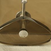 Brown smoked glass coat hook from the 1970s.
