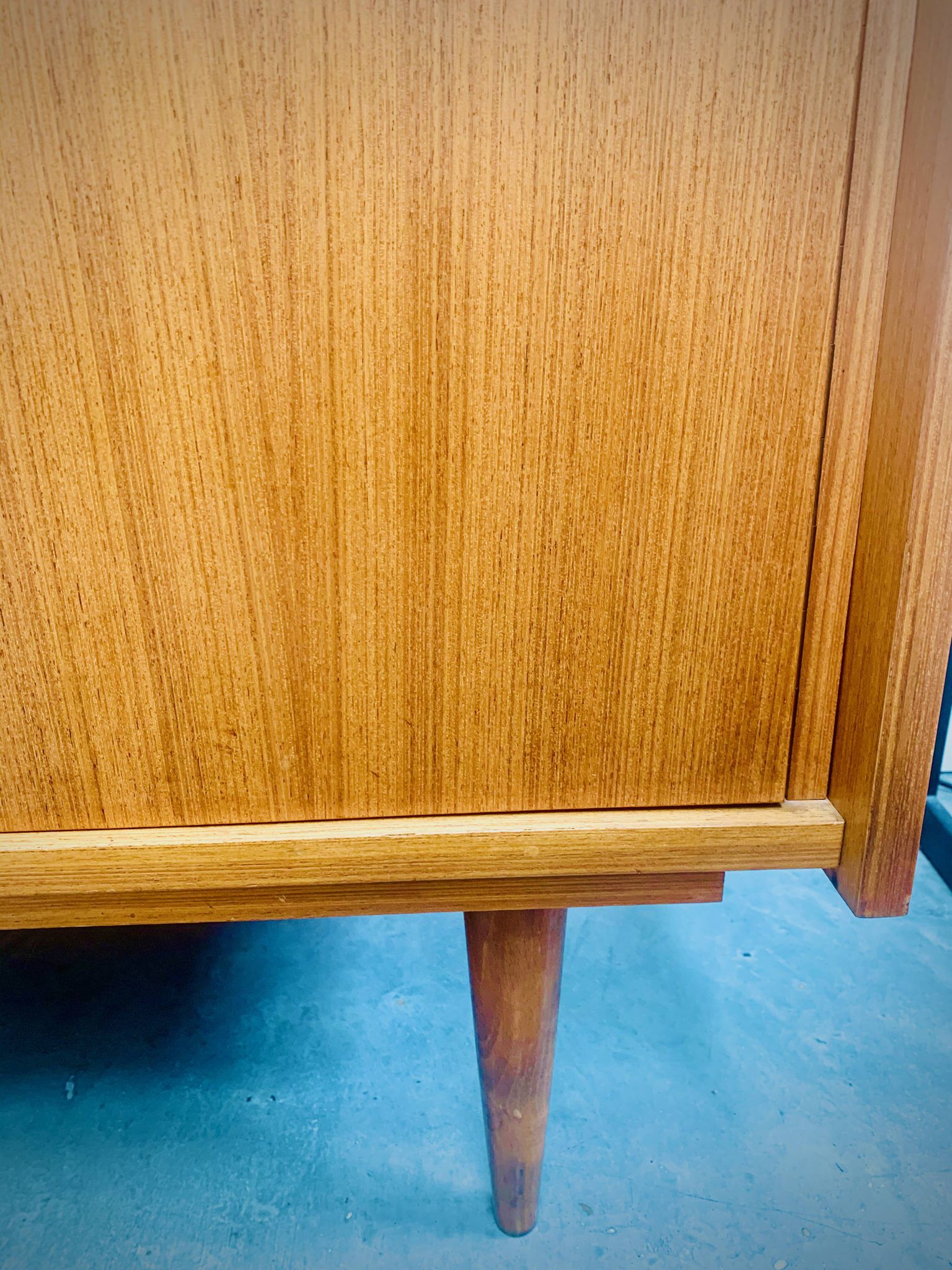 Double display case mounted at an angle with doors from the Capelle 60' house in Montauban