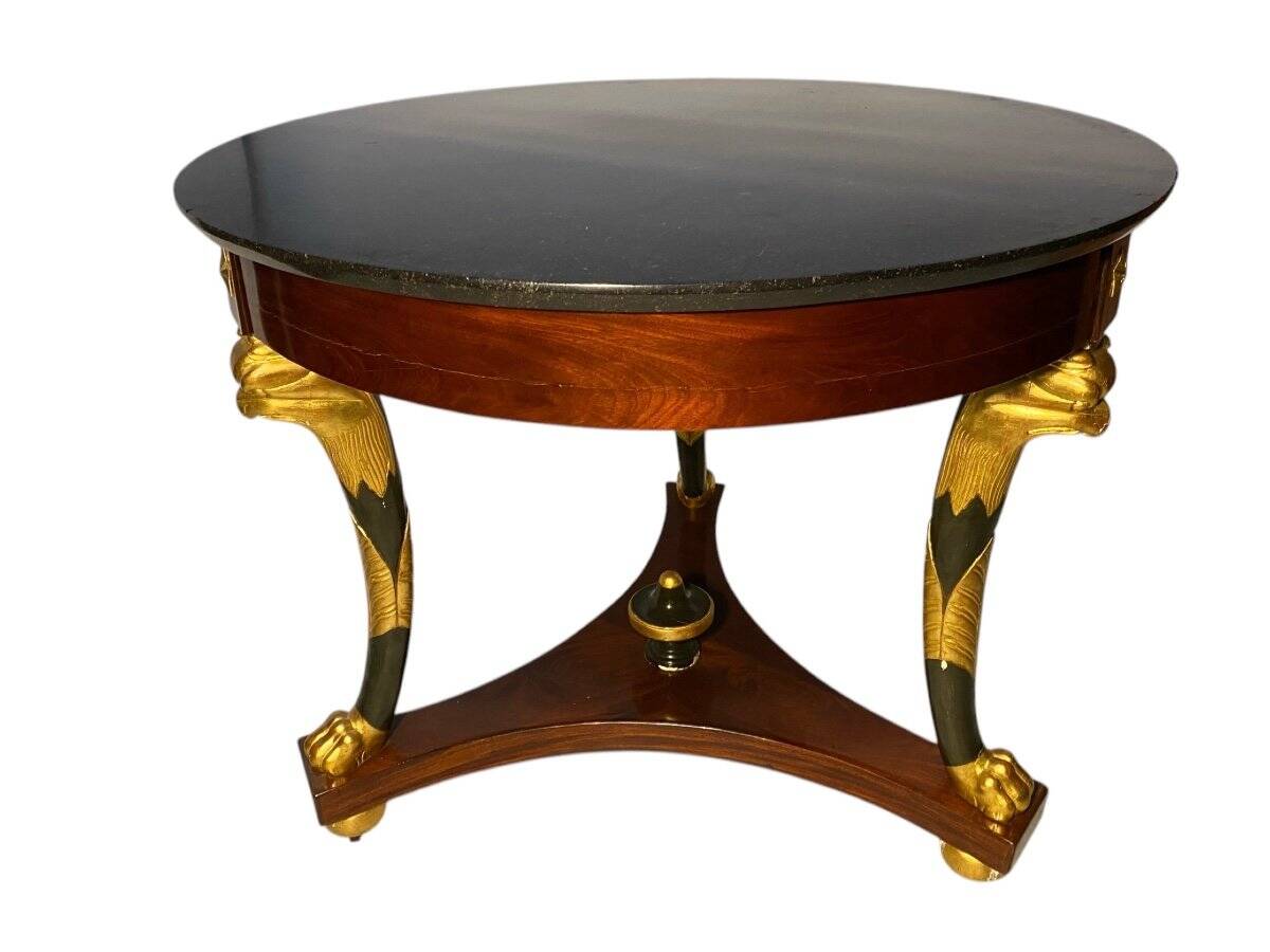 Grand guéridon aux corbins d’époque Empire