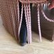 Fauteuil crapaud vintage rose en velours a franges