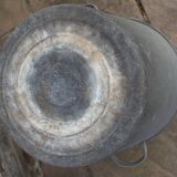 Old galvanized zinc trash can with lid