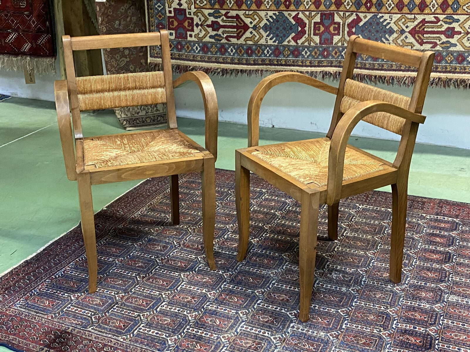 Pair of beech and straw armchairs