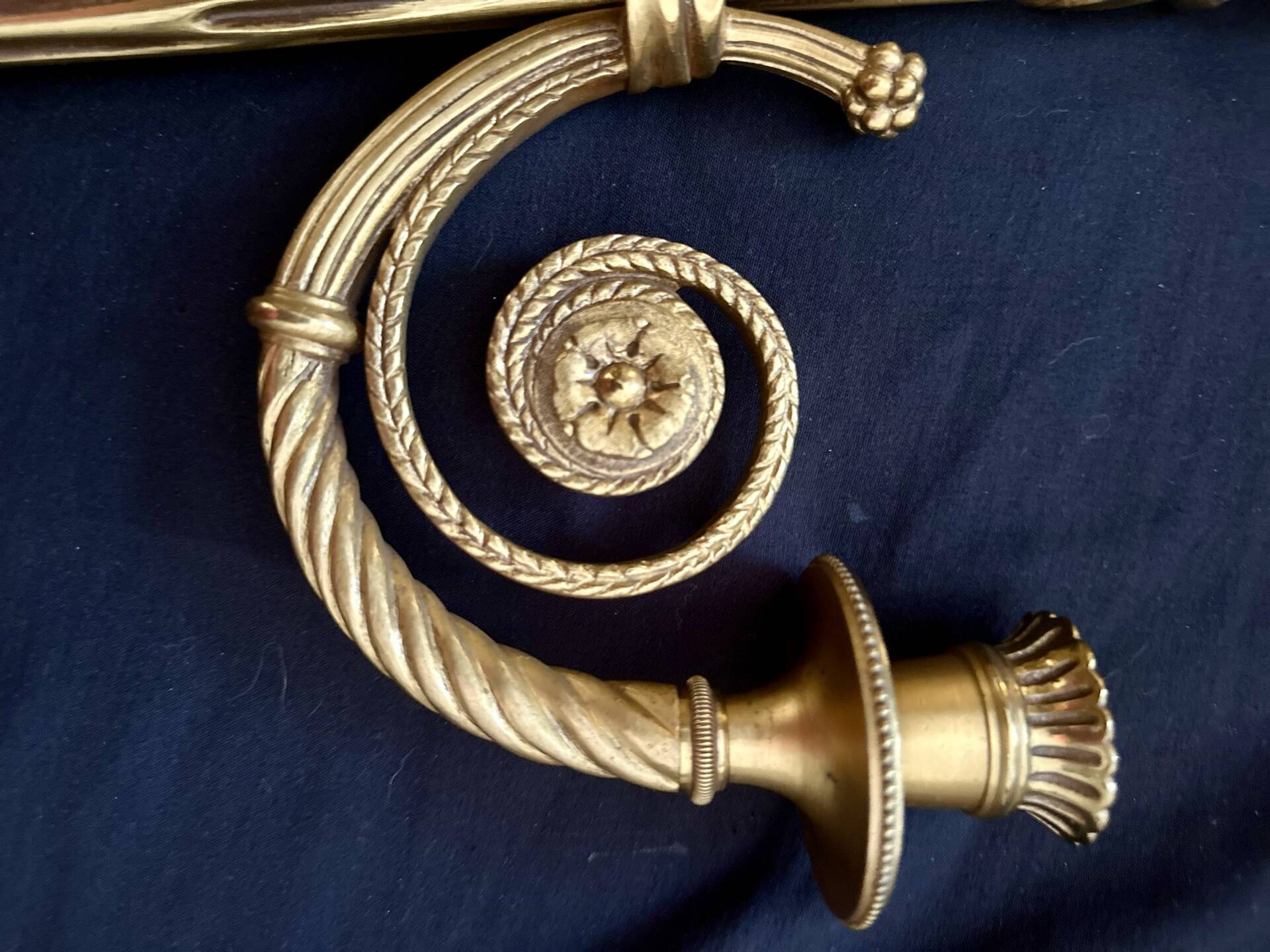Pair of gilded bronze wall sconces in the Louis XVI style. 20th century.