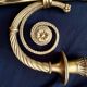 Pair of gilded bronze wall sconces in the Louis XVI style. 20th century.