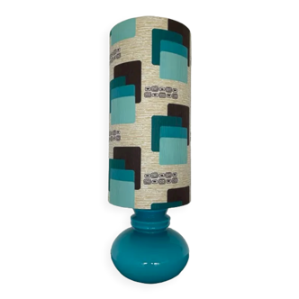 Blue opaline table lamp and vintage Maori fabric