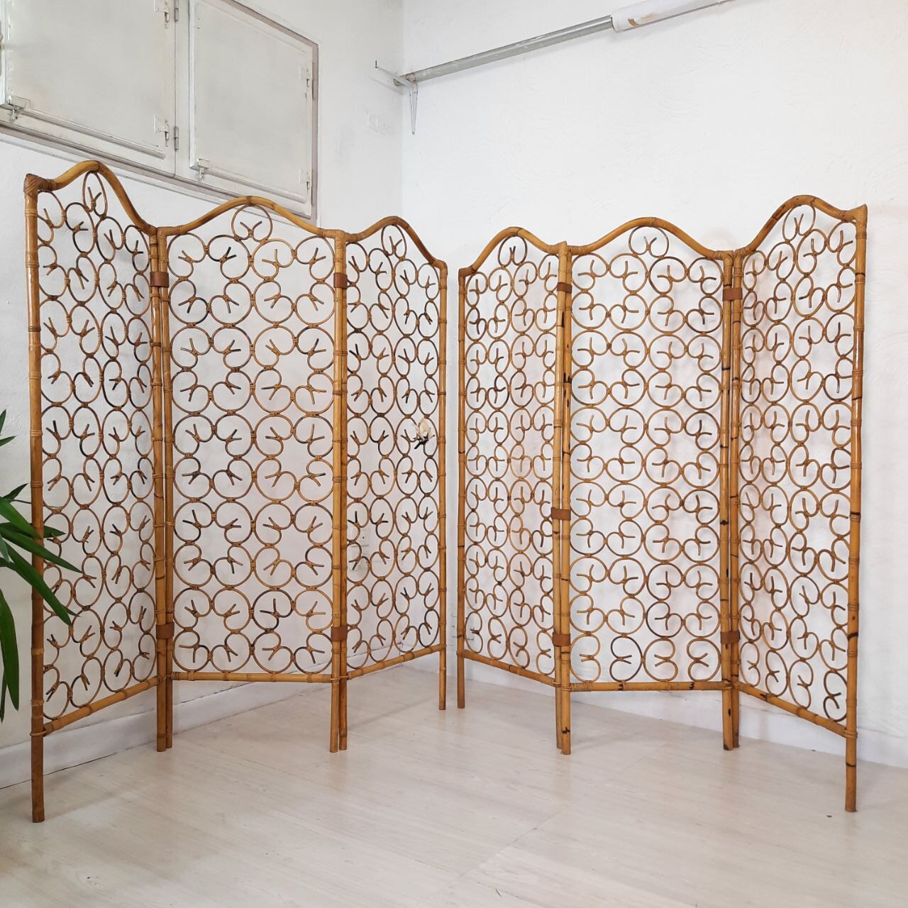 Vintage screen made of bamboo, wicker and leather