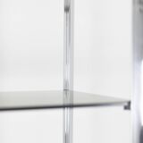 Pair of 6-shelf shelves with chrome-plated metal frames. 1970s.