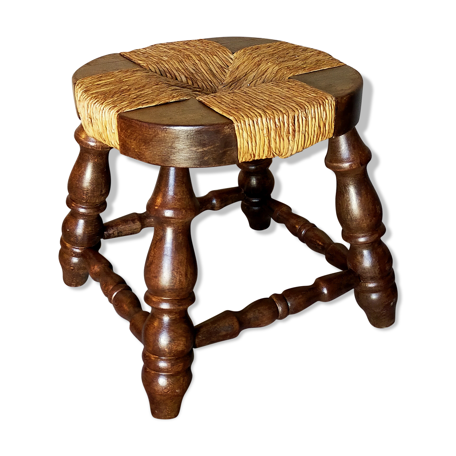 Low vintage regional stool in solid wood with straw top